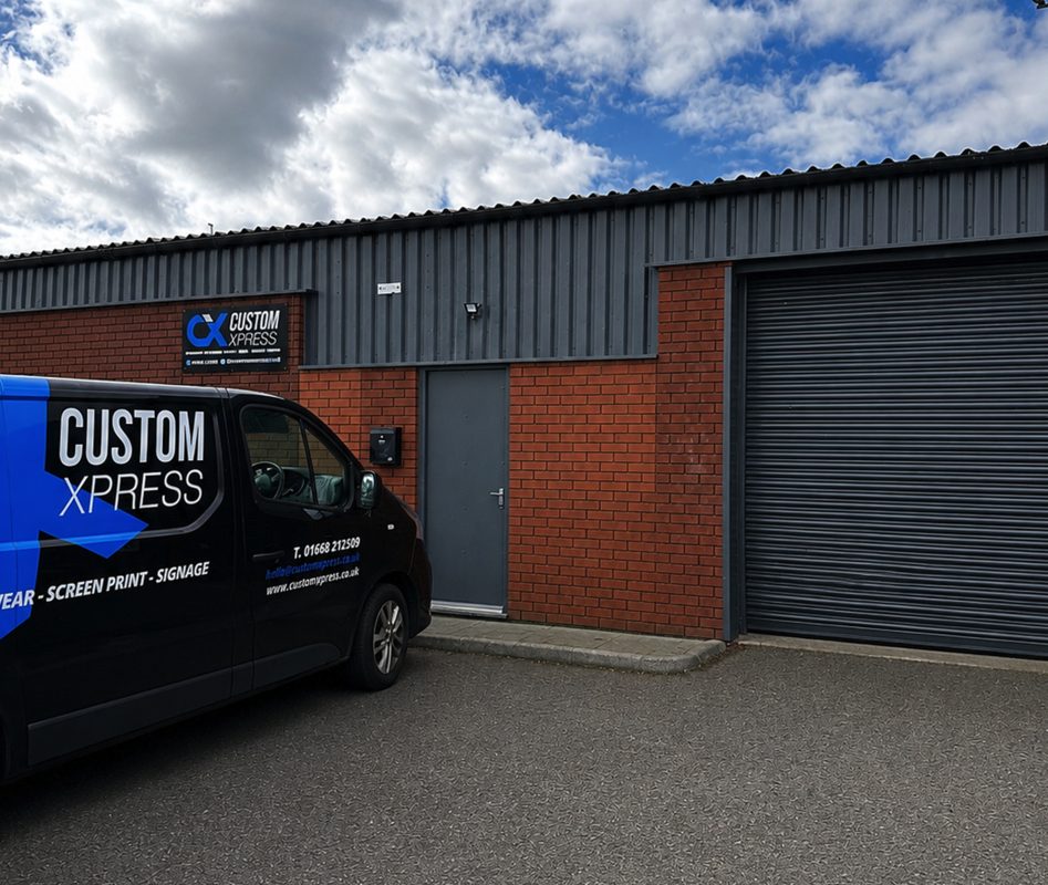Custom Xpress branded van outside our signage, print and workwear workshop in Alnwick