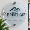 Round frosted acrylic stand-off sign with chrome wall fixings